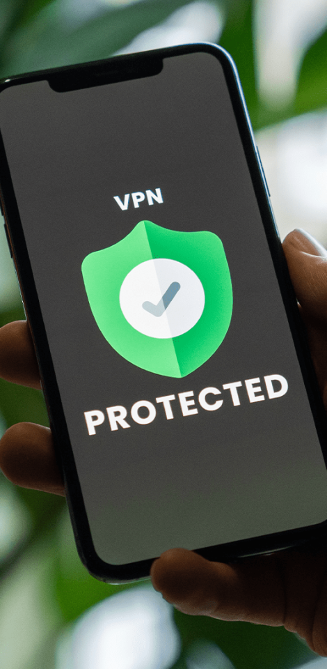 Person holding a phone with VPN turned on